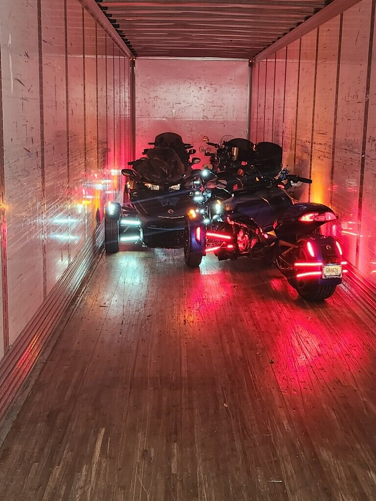 Motorcycles secured inside the trailer